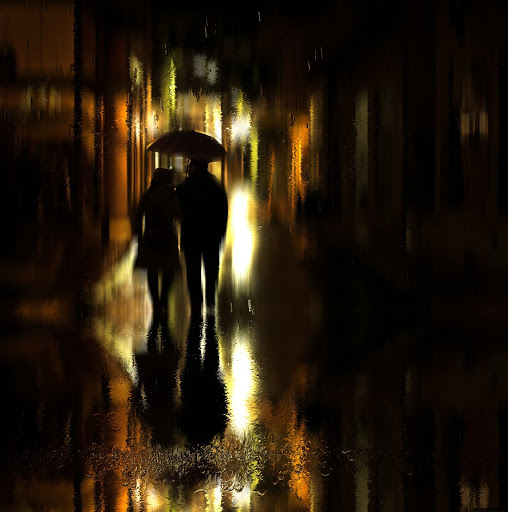 Couple silhouetted in the rain in Madison near The Vitagraph Apartments
